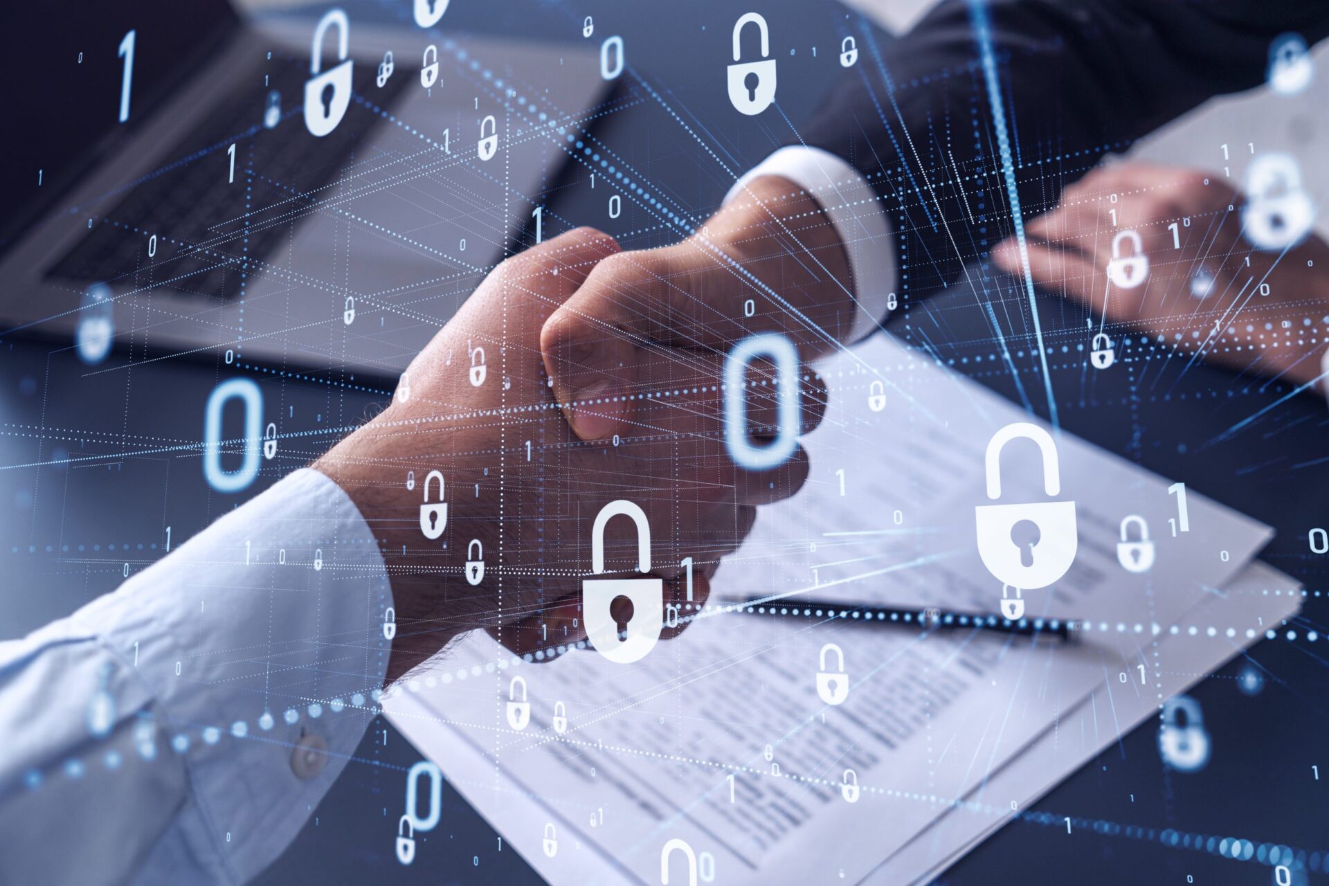 Handshake of two businessmen who enters into the contract to protect cyber security of international company. Padlock Hologram icons over the table with documents.